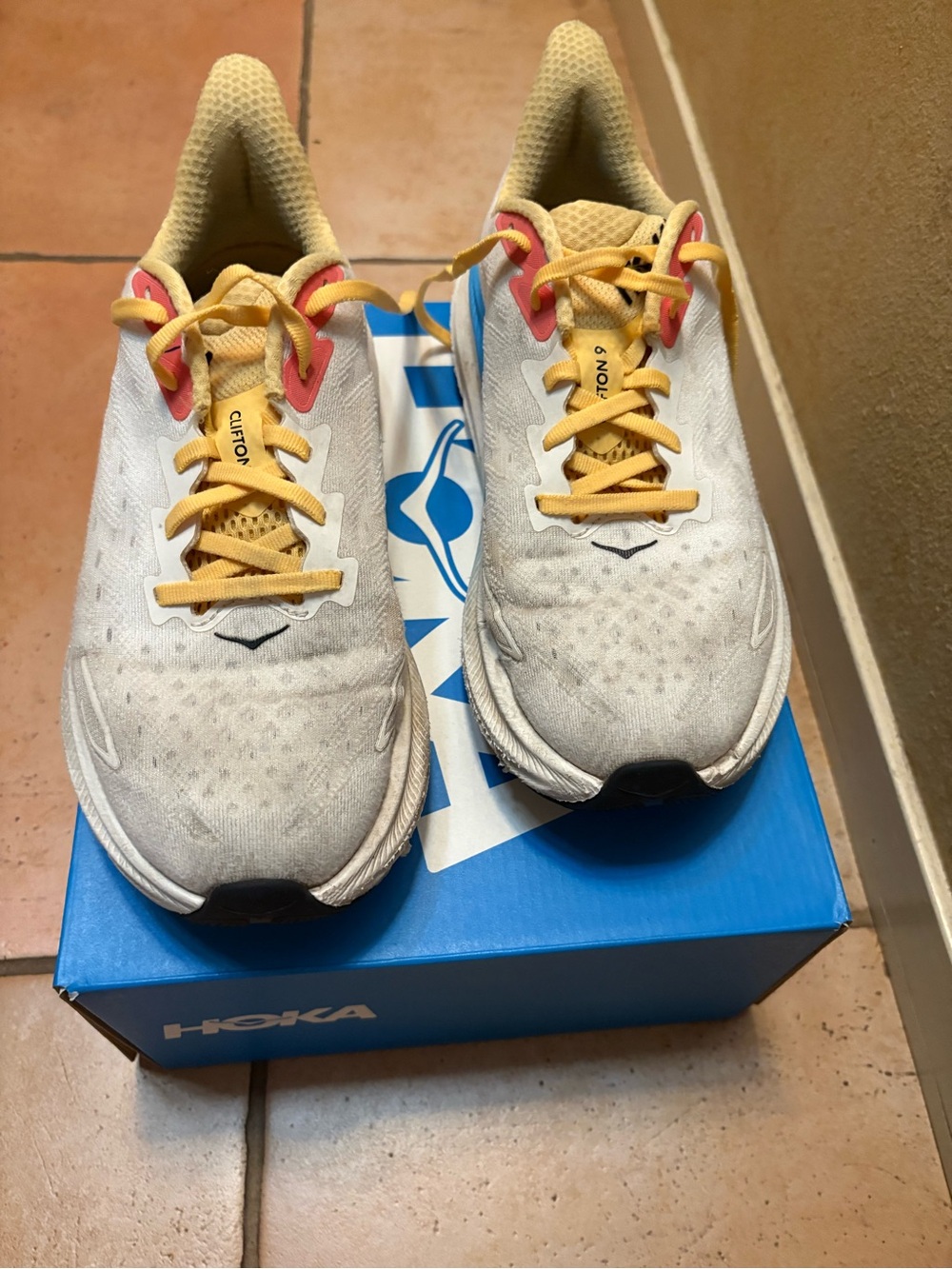 Hoka One One Women's White Running Shoes with Blue & Yellow Accents - Picture 3 of 5